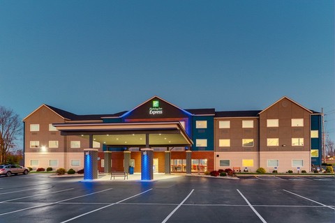 Hotel photography of Holiday Inn Express hotel exterior at twilight
